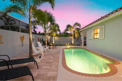 Charming Heated Pool Home - 3 miles to the Beach Pet and Family Friendly -Available Year Round!