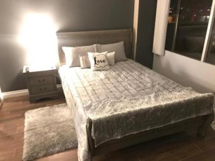 Amazing Spare Bedroom in Shared 2/B Condo behind Convention Center