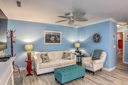 Breezy Beach Getaway Condo with Deck and Grill!